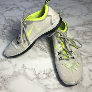 Nike Free 5.0 Running shoe Sz 9.5 white and yellow